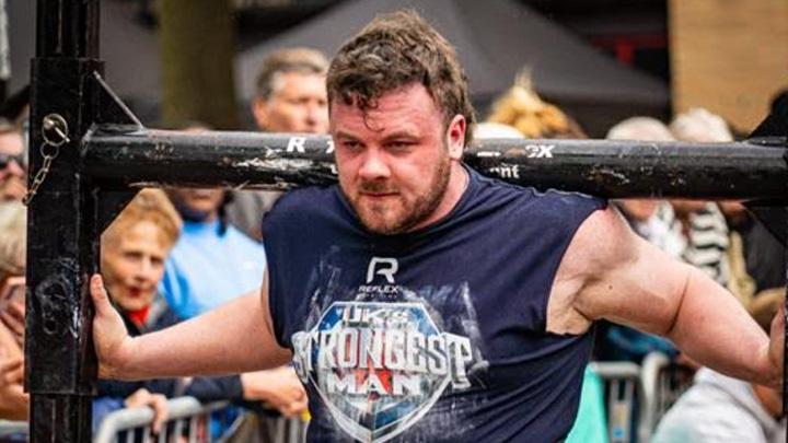 Luke Ogbourn lifting weights