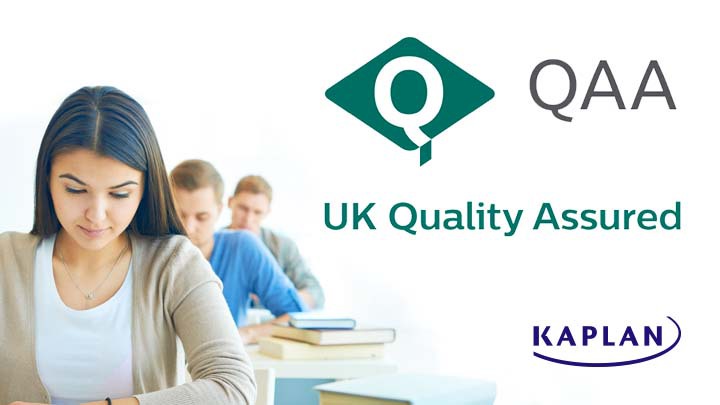 Students studying, with the QAA logo next to them