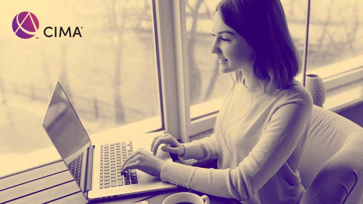 Young female student at a desk.