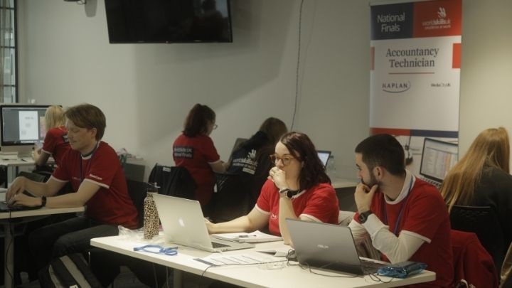 4 teams of 2 people sat at desks at the Worldskills accounting technician finals 2021