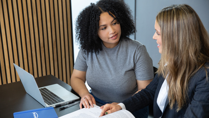 A tutor giving a student advice