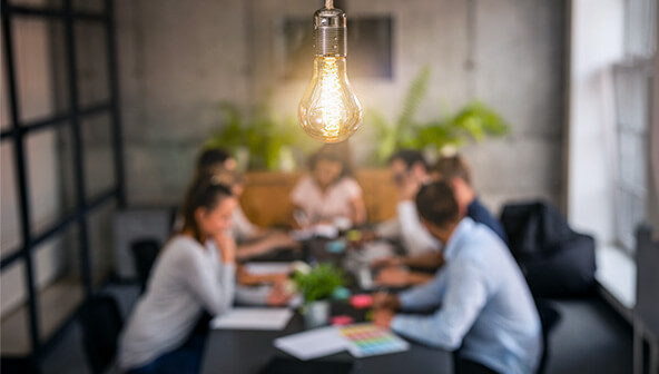 Group of people around a desk