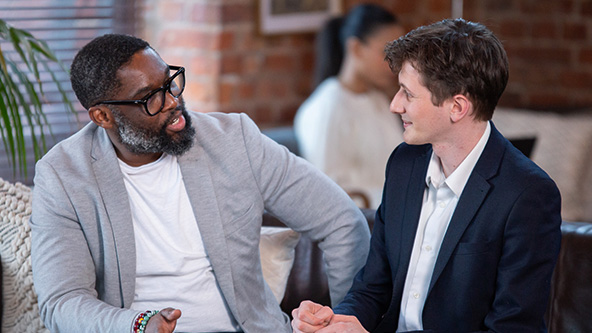 Two men talking