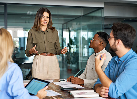Woman speaking to a group of people