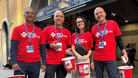 Four people from the Kaplan Borough High Street Office fundraising for London Air Ambulance (LAA).