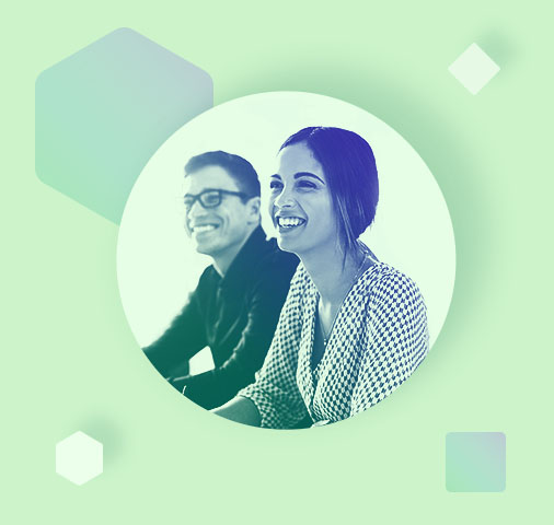 A man and a woman smiling