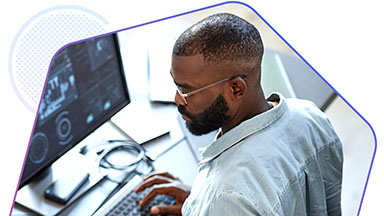 Man working at computer desk