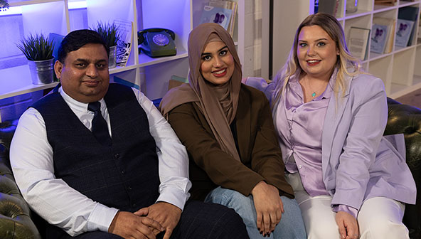 Laiba and Changez Baig sitting on a sofa with Kelsey Haslam
