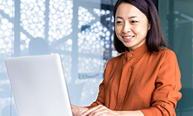 Woman working on a laptop