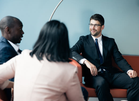 Two men and a lady talking