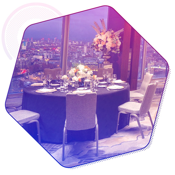 A table and chairs in the restaurant in Shangri-La, The Shard, London