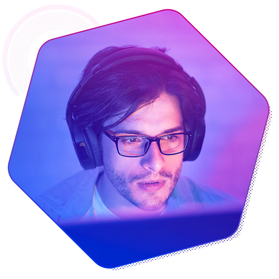 A man wearing glasses and headphones